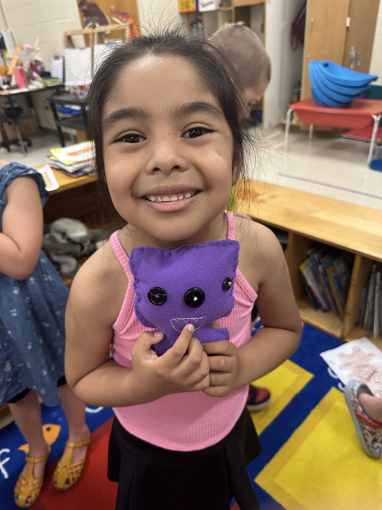 Vail kindergarten student with the finished "monster"