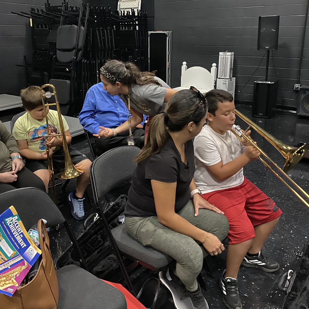 Students learning about their trombones