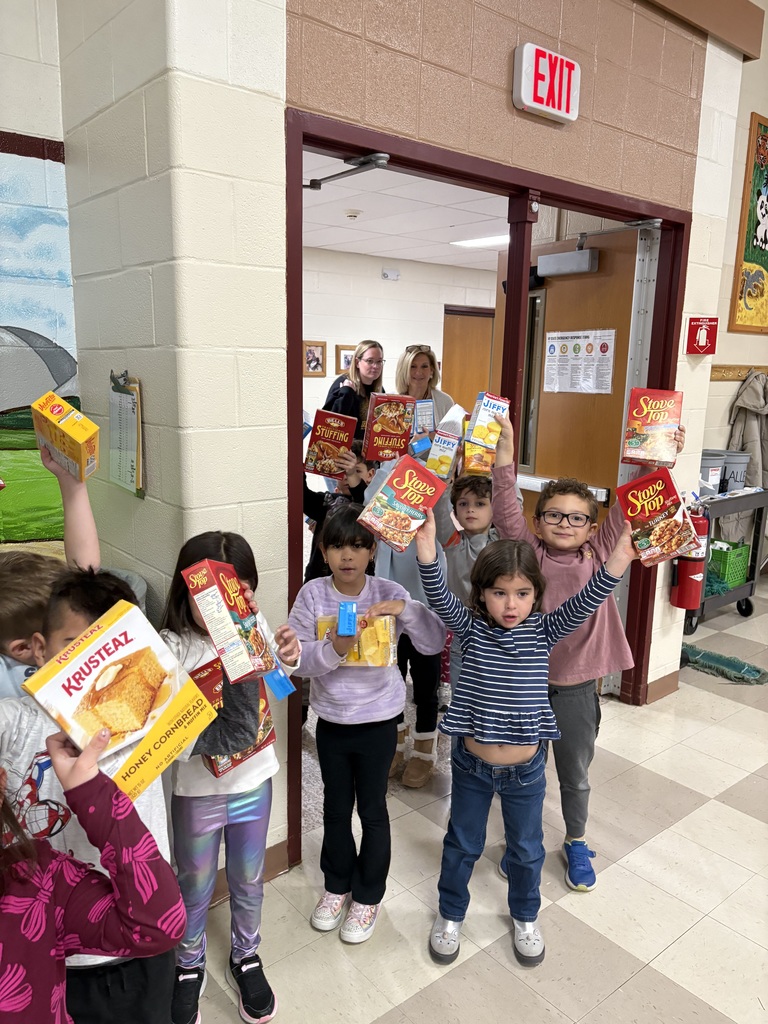 Students bringing donations to the cafeteria