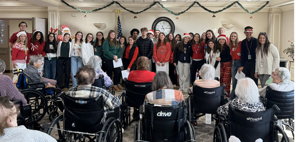 AHS Italian and Spanish Clubs bring holiday cheer to the Lutheran Care Center