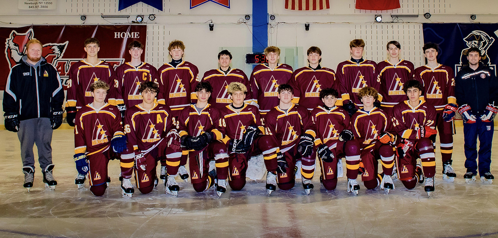 The AHS Hockey team group photo with coaches