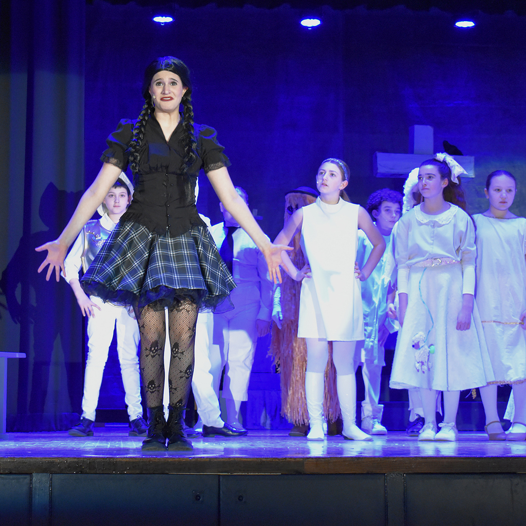 Scene from the LMS performance of The Addams Family Musical, with Wednesday center stage