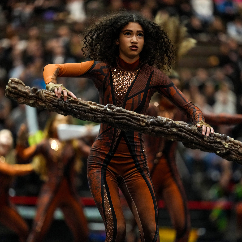 image of a member of the Arlington Winter guard performing March 21