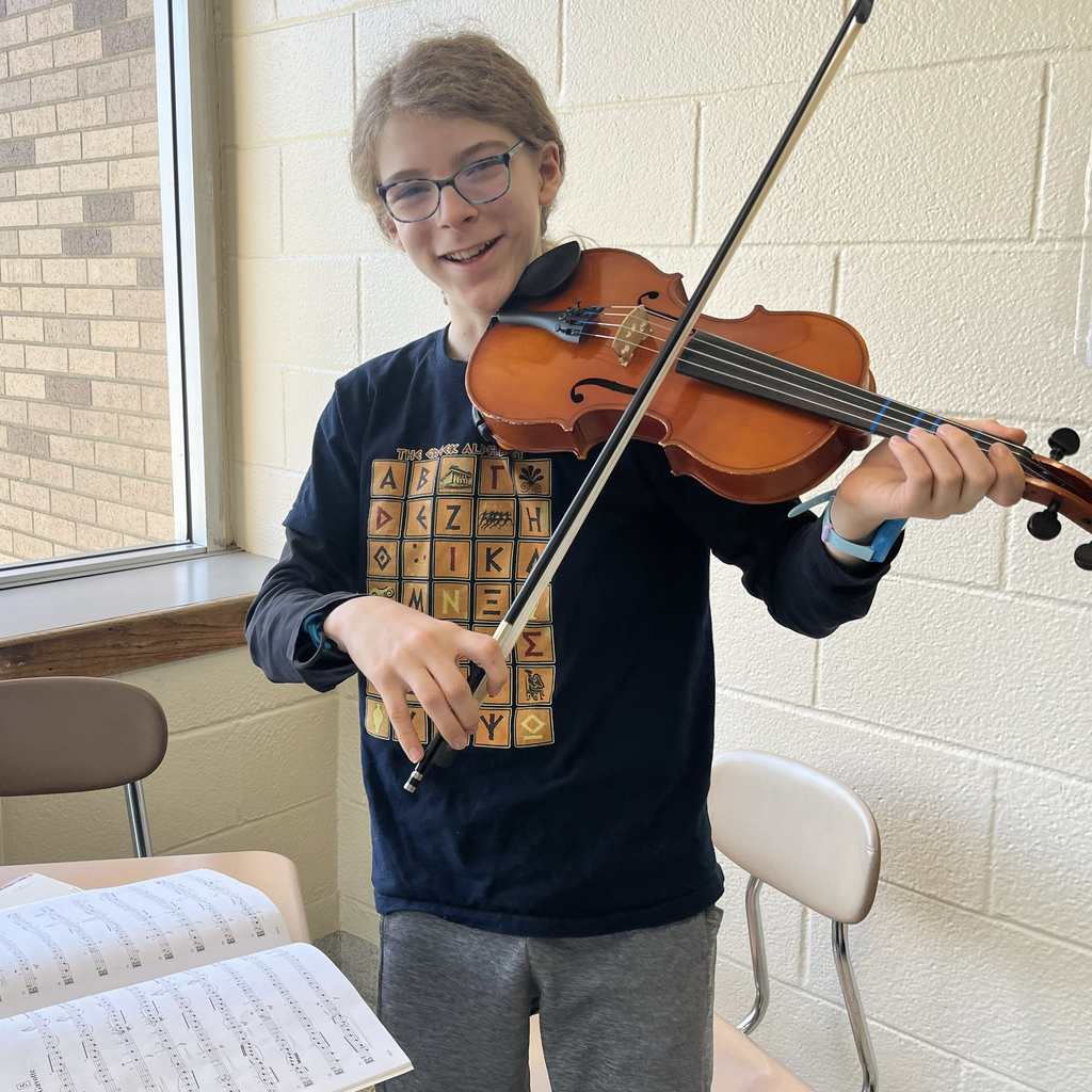 student playing violin