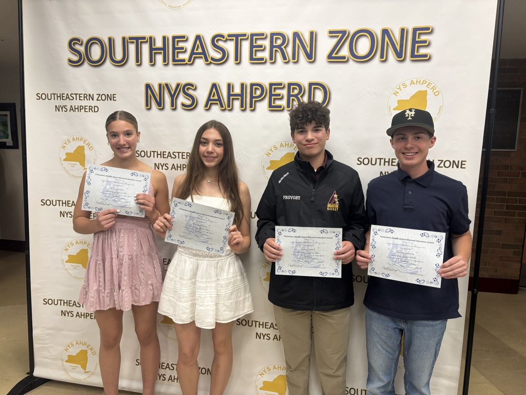 Fallon Hocutt, Annika Andren, Luke Provost and Nicholas Johnson show off their awards