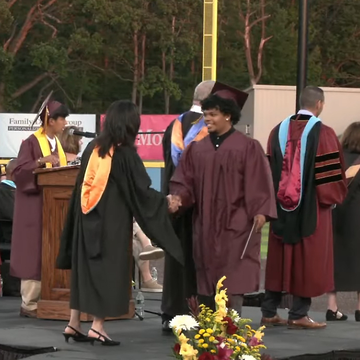 AHS student is congratulated at graduation