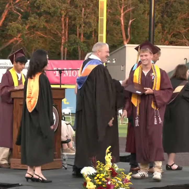 AHS Executive Principal Michael Murphy handing out diplomas