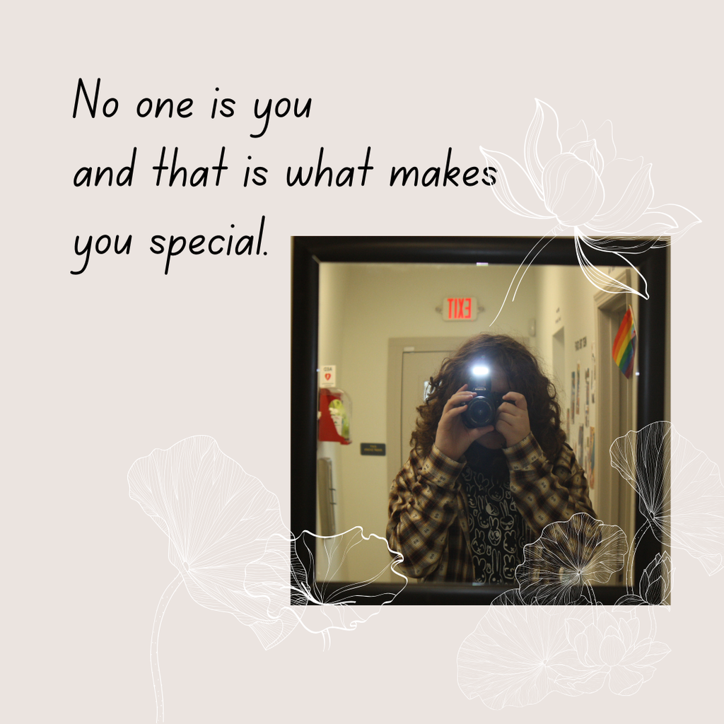 student taking picture in mirror on beige background with white line flowers