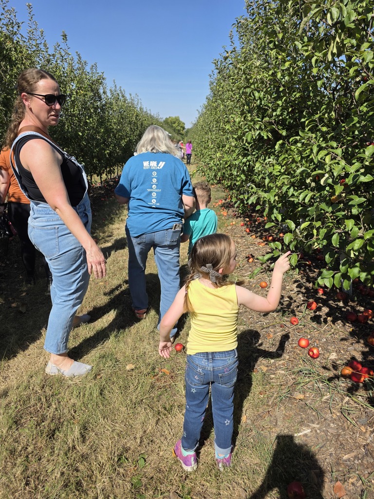 Picking apples with families