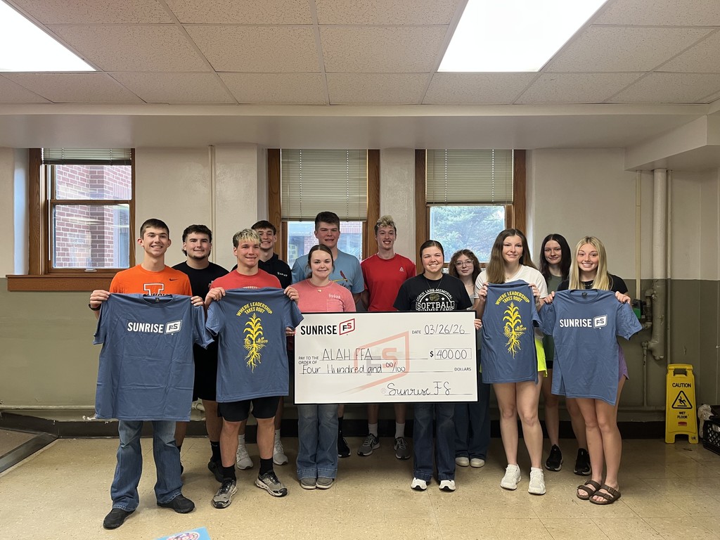 Students holding a check from a grant from Sunrise FS