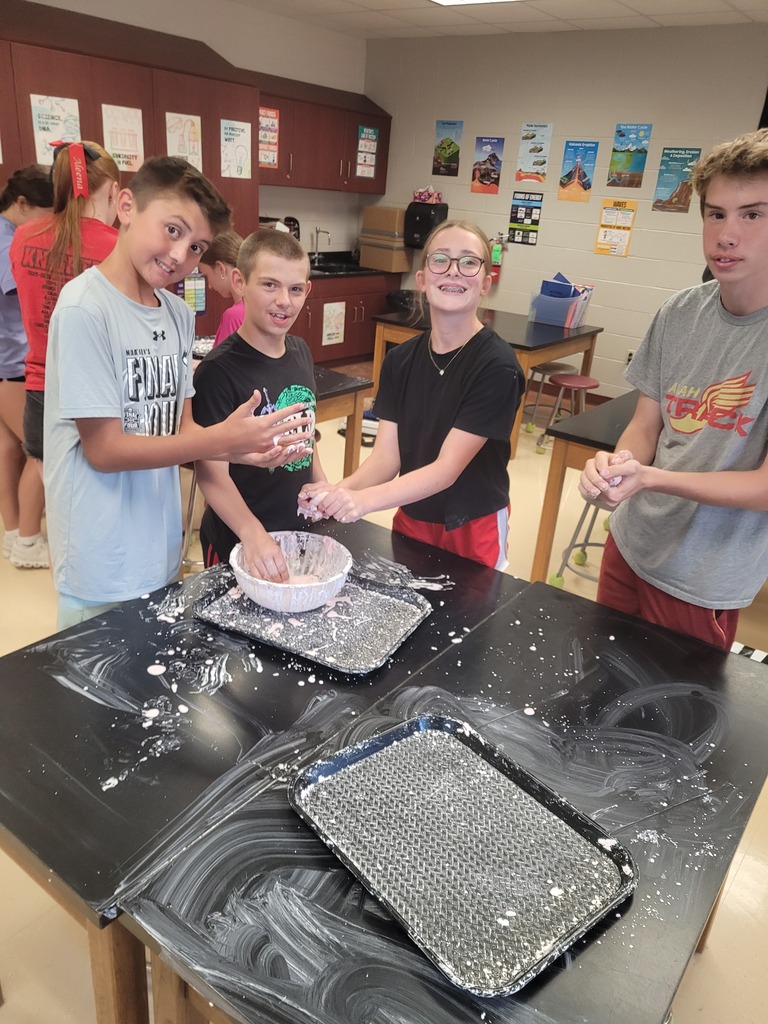 8th graders playing with oobleck