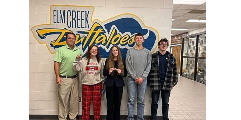 Photo: District Speech Team from left to right, Coach Jason Stubbs, sophomores Kelsey Kamarad, Kaitlyn Meints, Gavin Knajdl, and Marshall Pflum