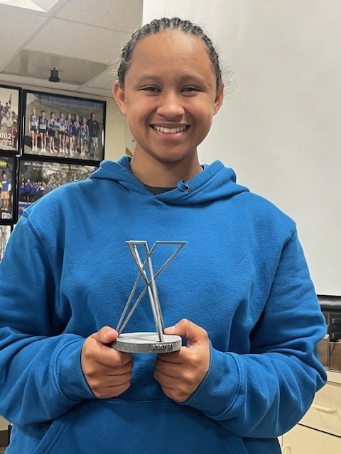 Photo: SHS Senior Lily Bowens holds the finished first “Arrival” she created with the SHS 3D Printer program in her computer class.