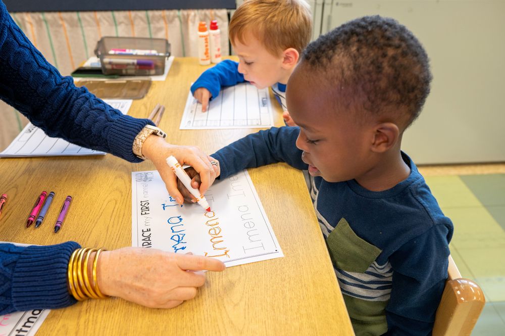 ELC student learning to write