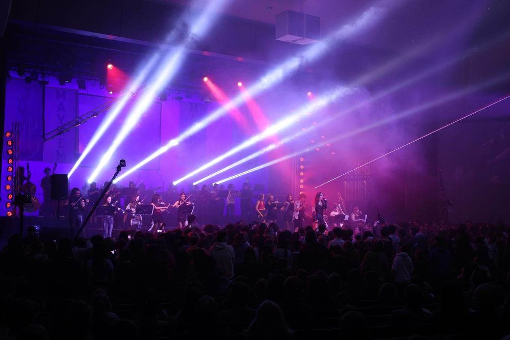 Project Mayhem electric violinists play on performing arts stage