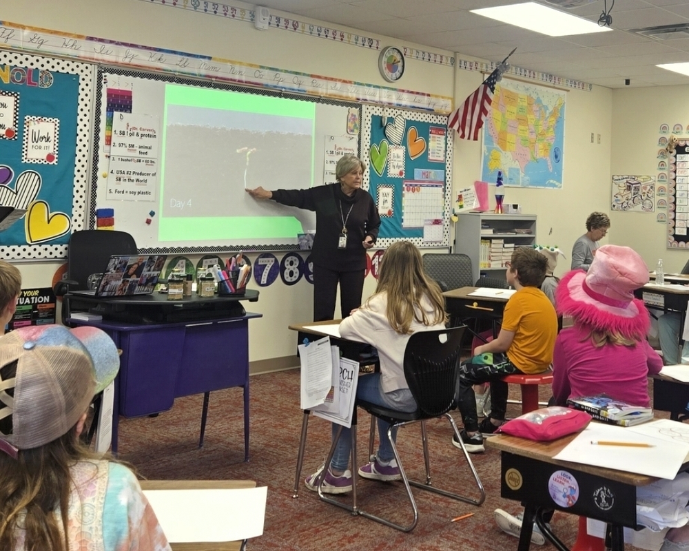 One of the presenters sharing information about soybeans