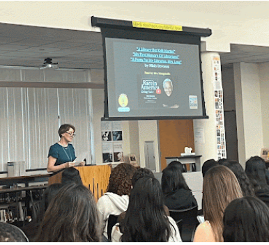 woman speaking at podium