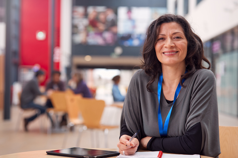 Photo of a school principal smiling
