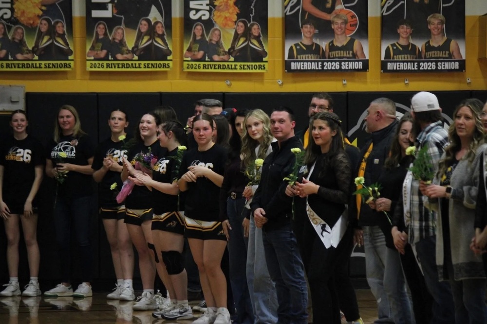 Seniors receiving flowers