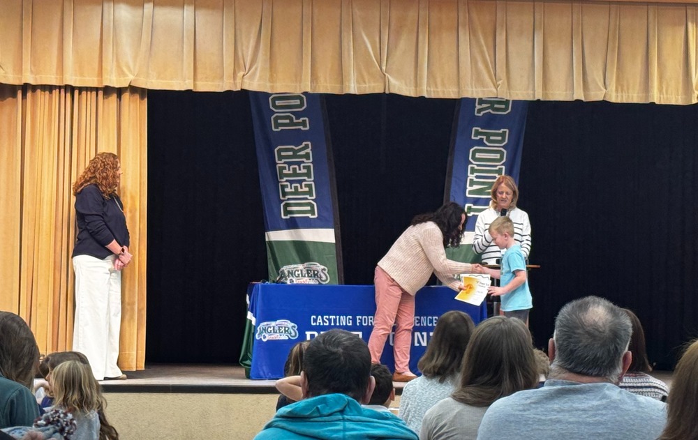 Student receives award on stage