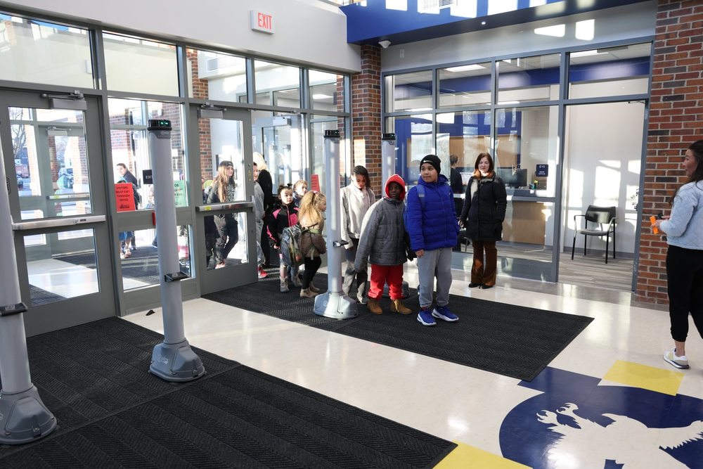 Students walking into the new Edison School Building. 