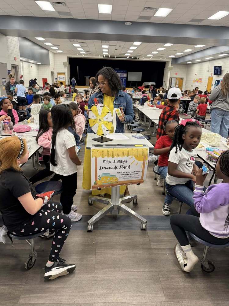 Mrs. Larry at her lemonade stand