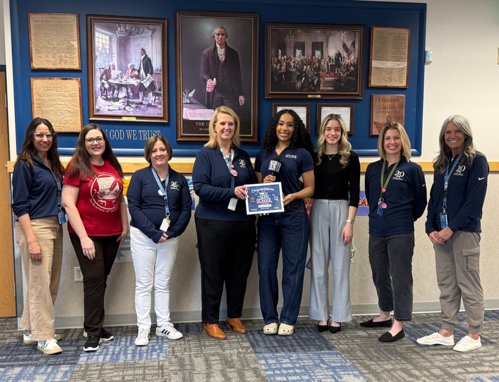 Admin and Enrichmet team receiving Cool School of the Week recognition