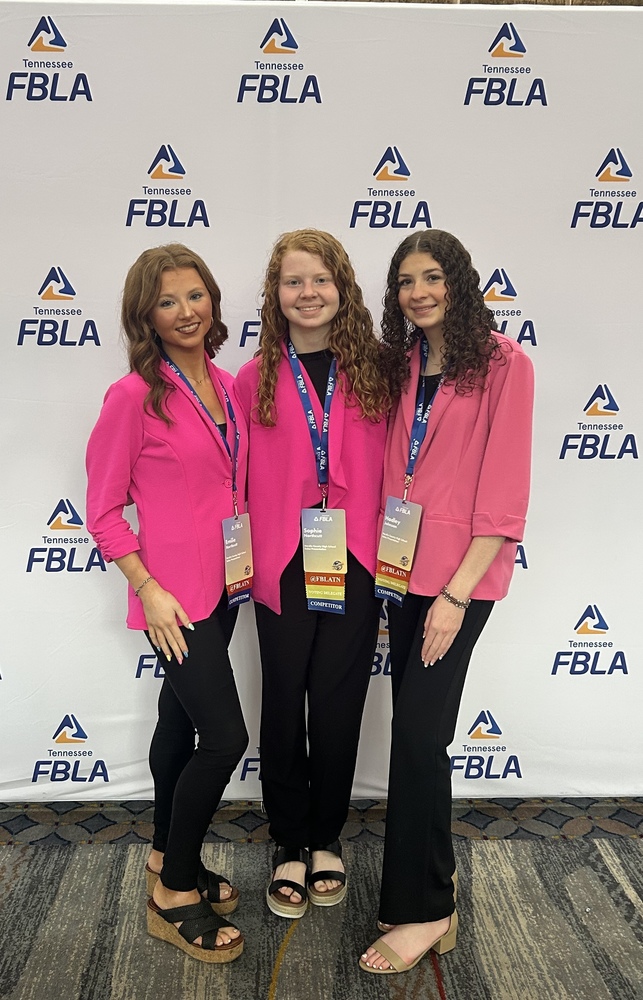 Three FBLA students posing for a picture.
