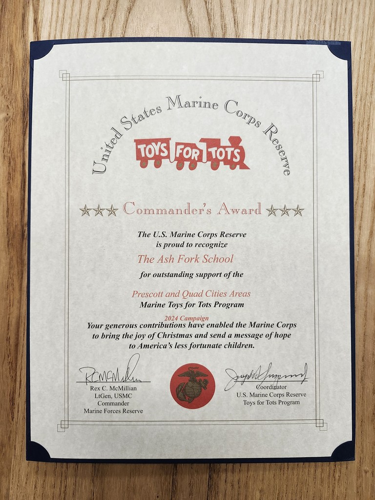 Photo of Toys for Tots Commander's Award presented to Ash Fork School