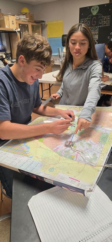 Students working on map
