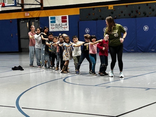 Kindergarten playing during PE