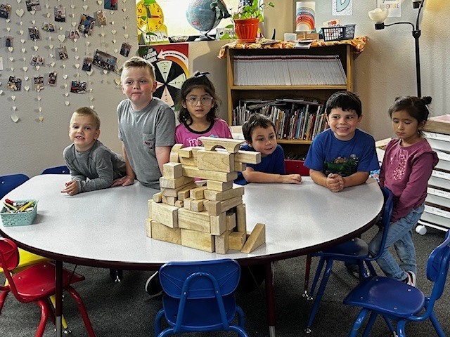 Kindergarten students building blocks