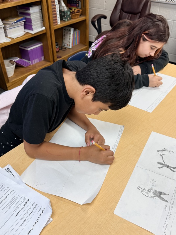Juan and Aurianna working hard.