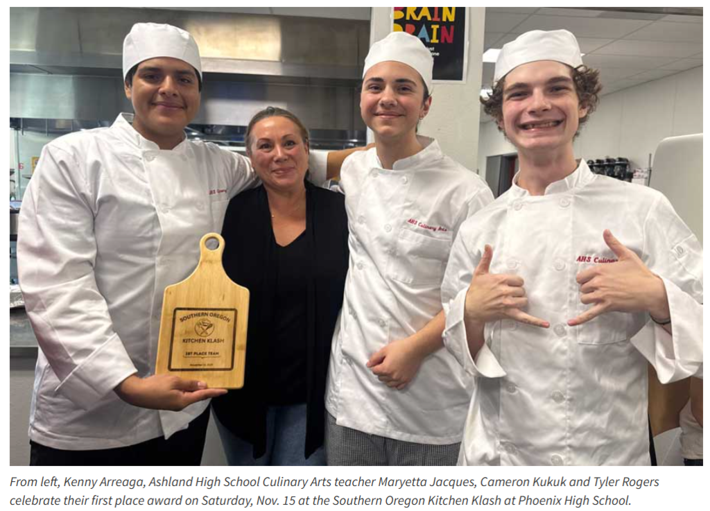 Photo of AHS culinary students with culinary arts teacher, Maryetta Jacques 