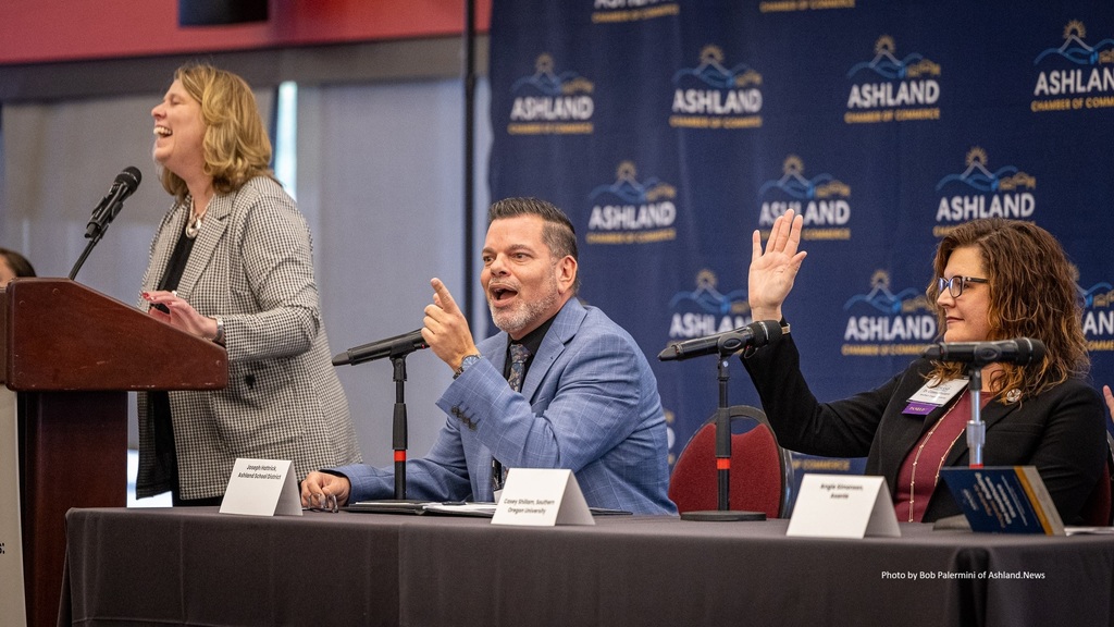 Panelists engaging with speaker 