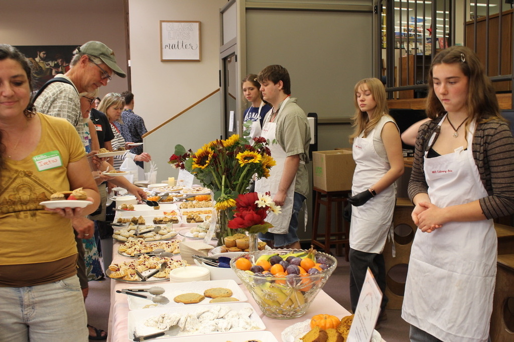 Students serving treats
