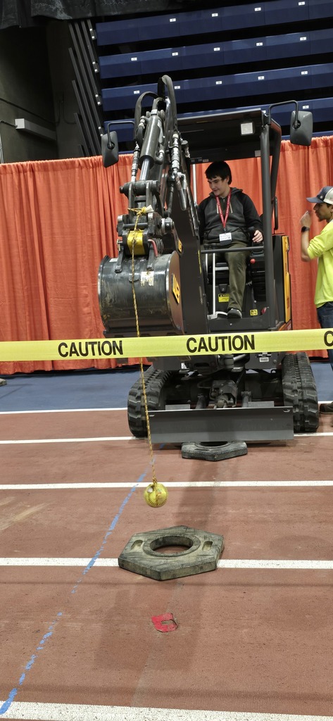 Student working an excavator. 