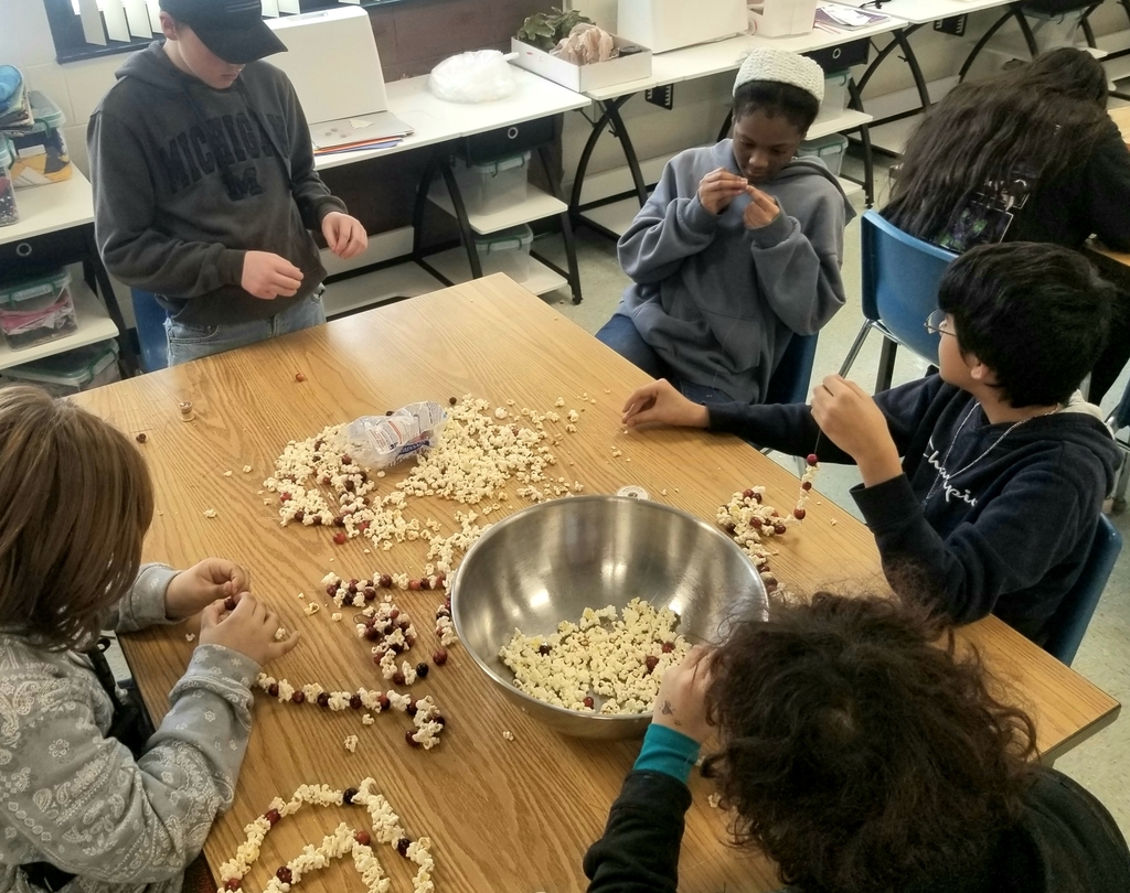 Bradley Yelsik, Skylar Redmond, Nom'Aria Barajas, Robert Cancino Dennis, Jasmin Ricci and Madyson Ringle work to make bird treats for the Ashley Care Center wildlife area.