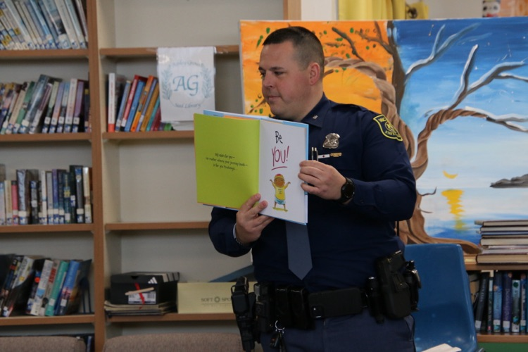 police officer reading a book 