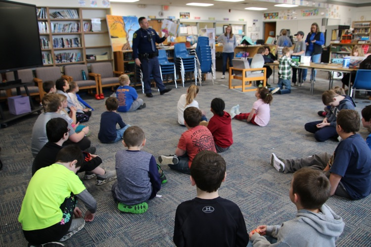 police officer reading a book 