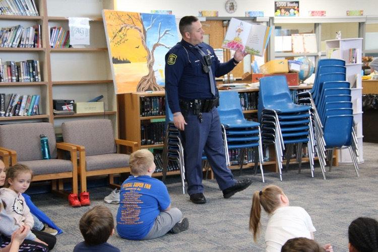 police officer reading a book 