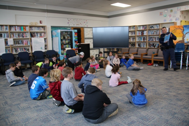 police officer reading a book 
