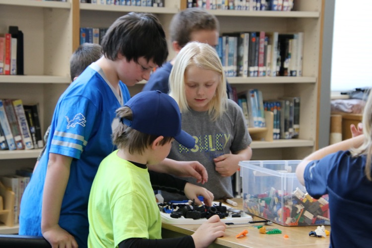 students playing with Legos