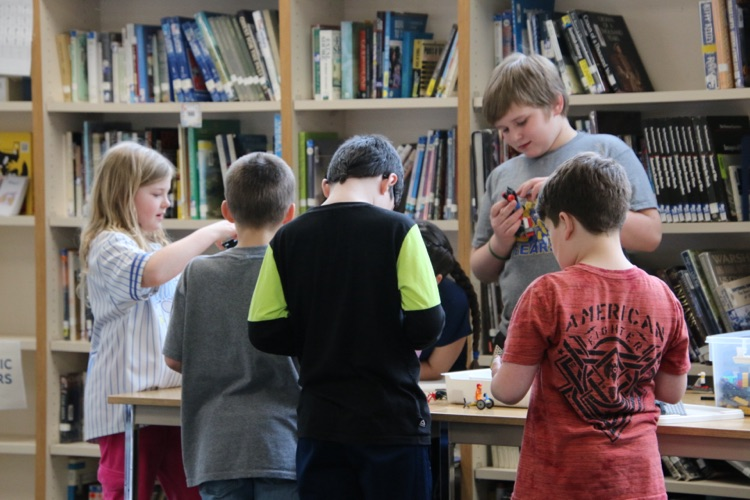 students playing with Legos