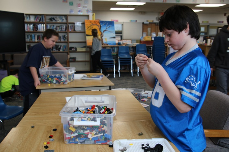 students playing with Legos