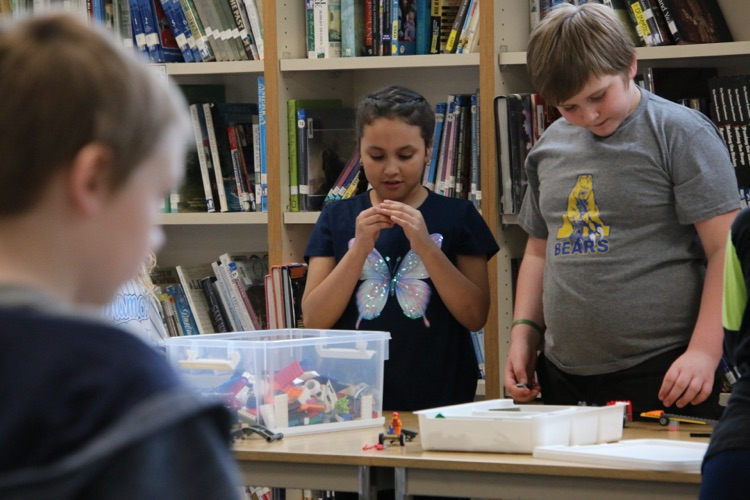 students playing with Legos