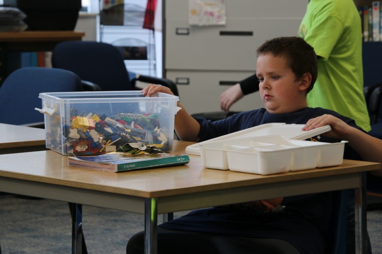 students playing with Legos