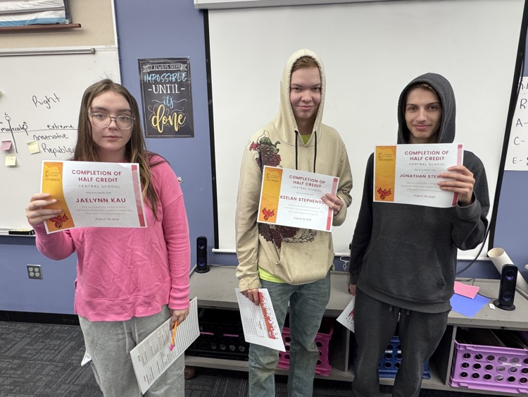 3 students hold a certificate