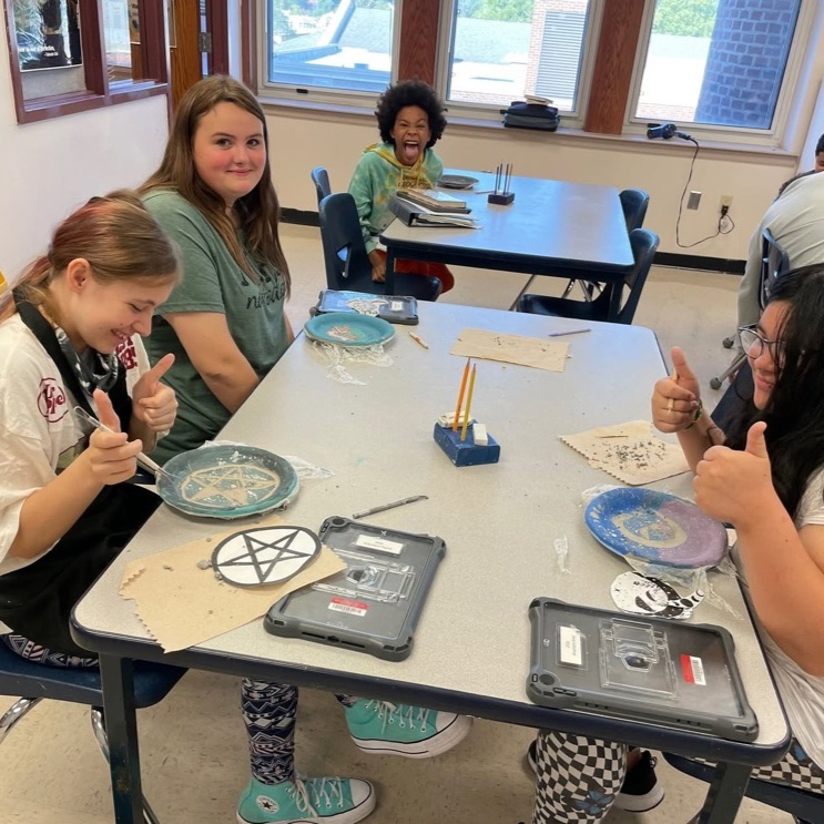 students working on art projects
