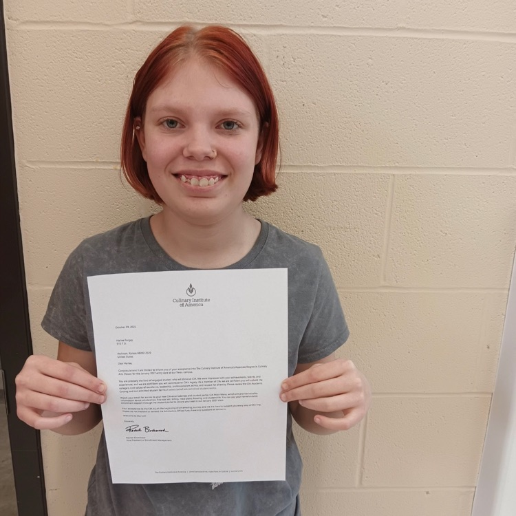 student with acceptance letter